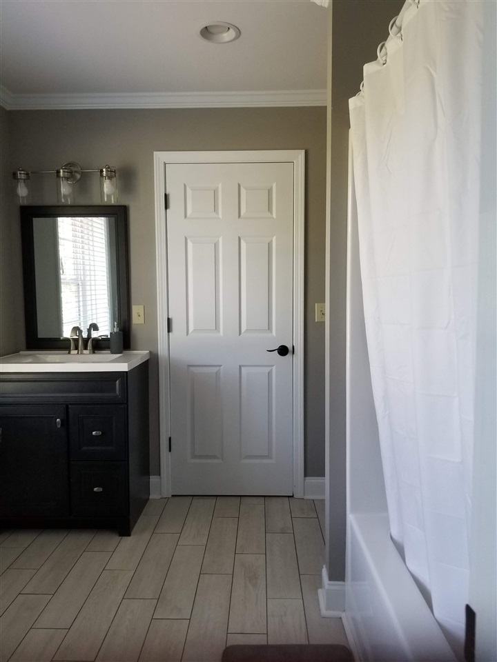 2 Cr 518b Road Rienzi, MS 38865 - Photo 15 of 24 a bathroom with a vanity and a mirror