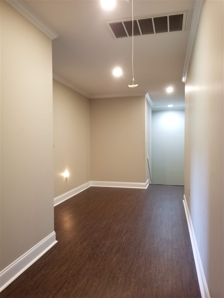 2 Cr 518b Road Rienzi, MS 38865 - Photo 20 of 24 an empty room with wooden floor and windows