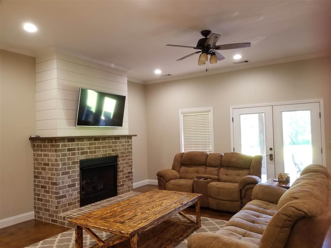 2 Cr 518b Road Rienzi, MS 38865 - Photo 5 of 24 a living room with furniture and a fireplace