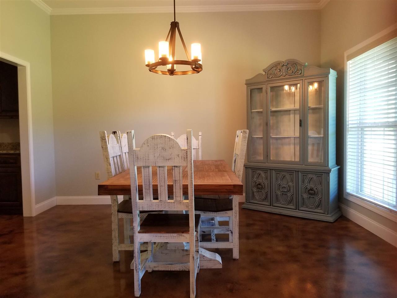 2 Cr 518b Road Rienzi, MS 38865 - Photo 7 of 24 a view of a dining room with furniture wooden floor and chandelier