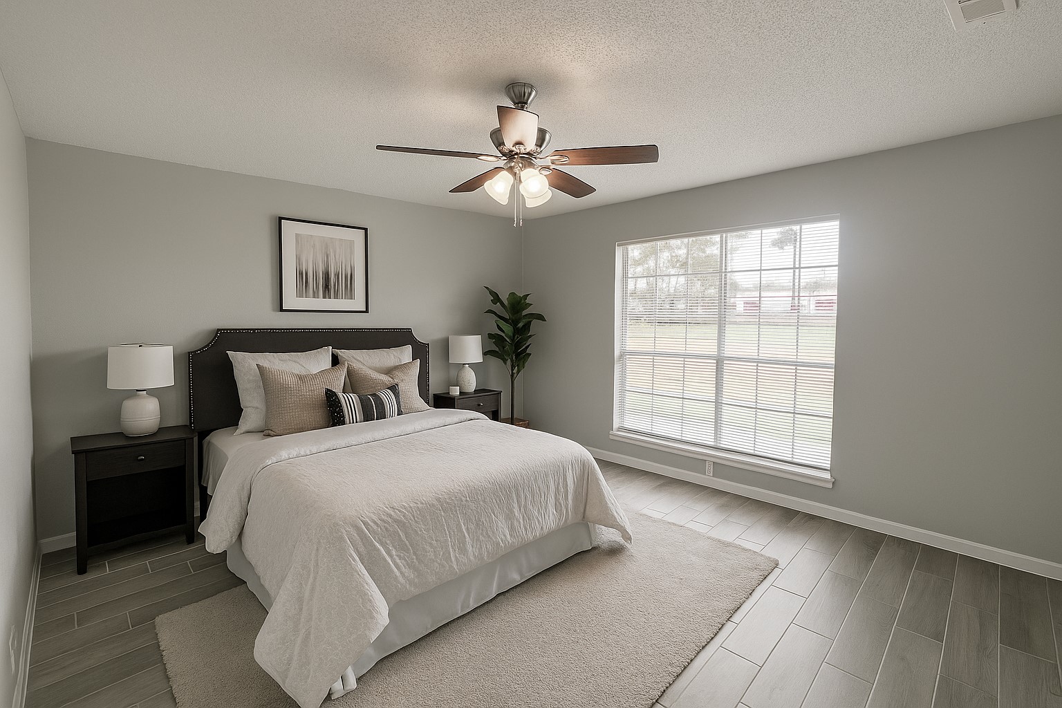 23460 Smith Road Porter, TX 77365 - Photo 12 of 46 a bedroom with a large bed and a window
