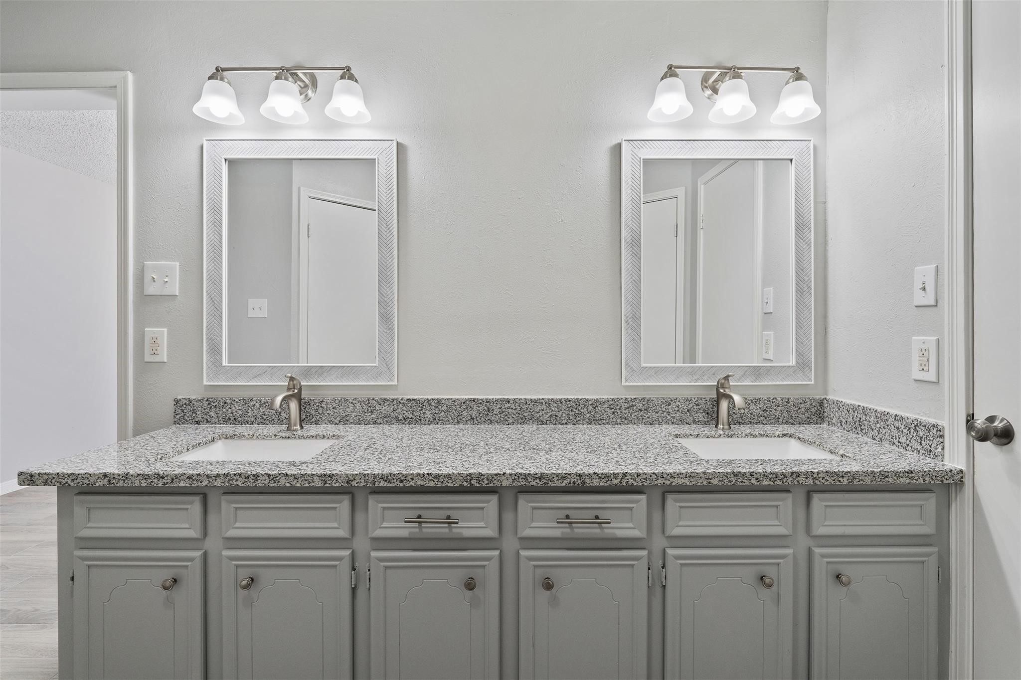 23460 Smith Road Porter, TX 77365 - Photo 30 of 46 a bathroom with sink and mirror