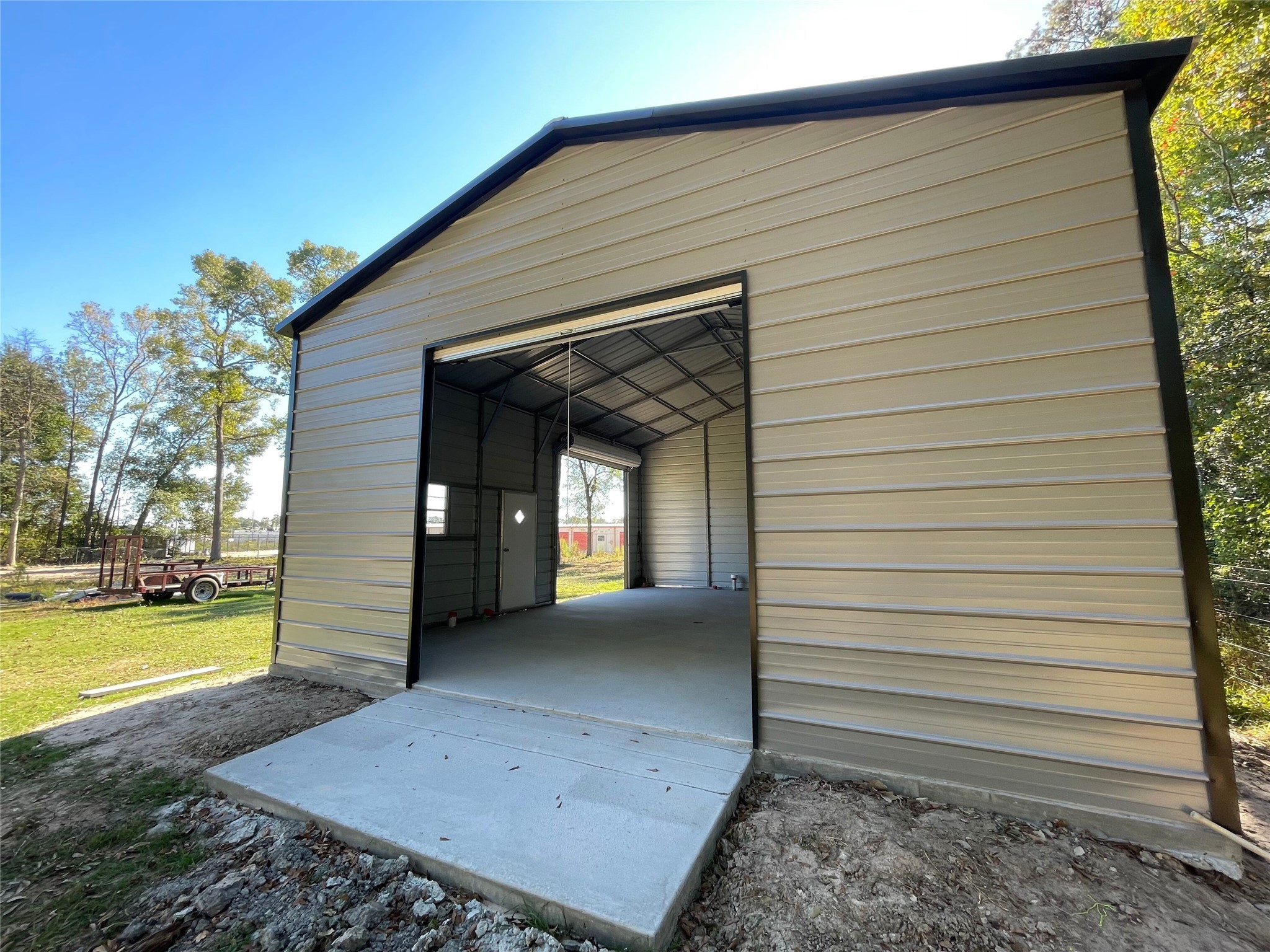 23460 Smith Road Porter, TX 77365 - Photo 6 of 46 a view of a back yard of the house