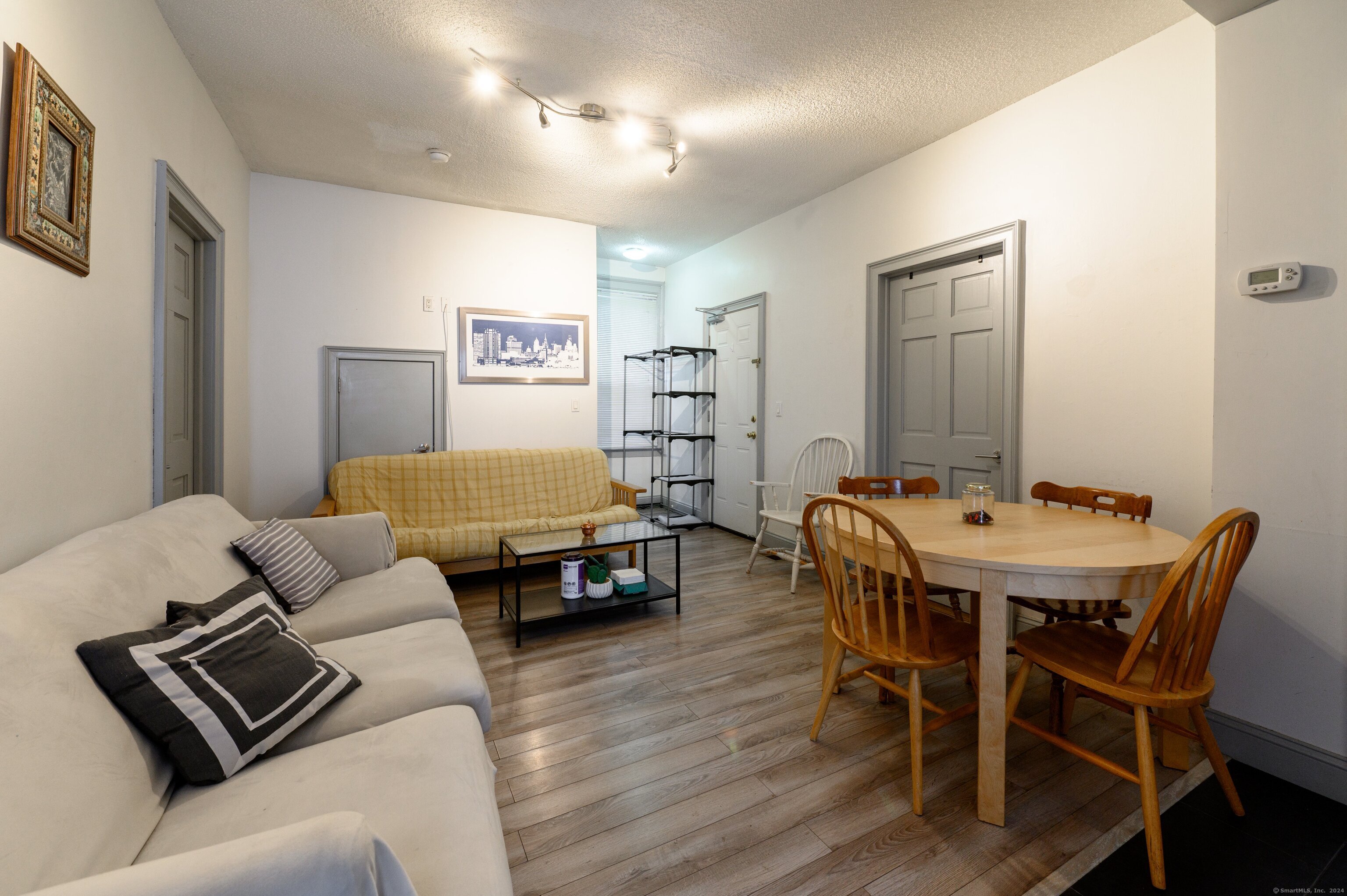 54 Mechanic Street New Haven, CT 06511 - Photo 19 of 22 a living room with furniture and wooden floor