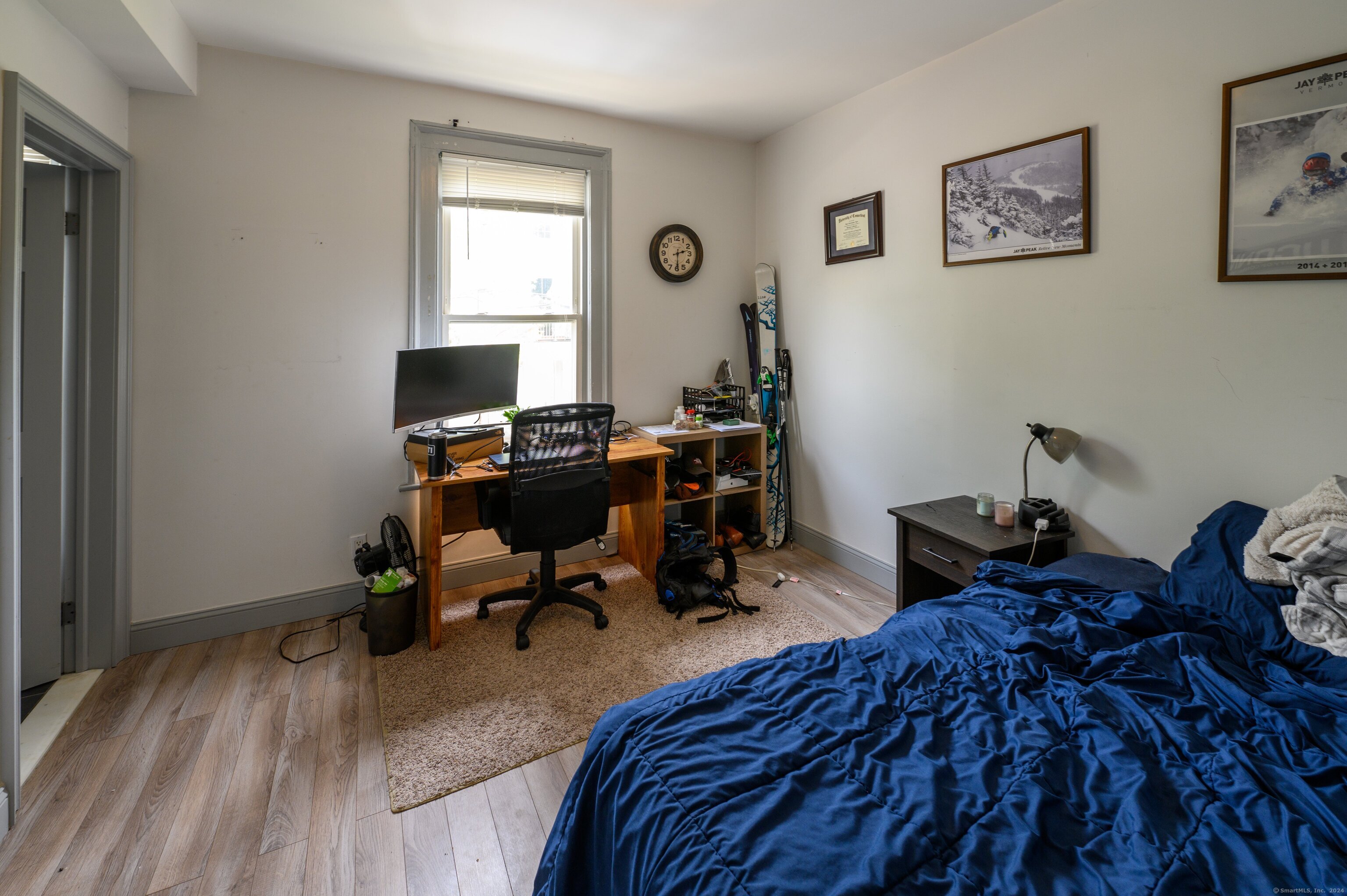 54 Mechanic Street New Haven, CT 06511 - Photo 5 of 22 a bedroom with a bed and a desk
