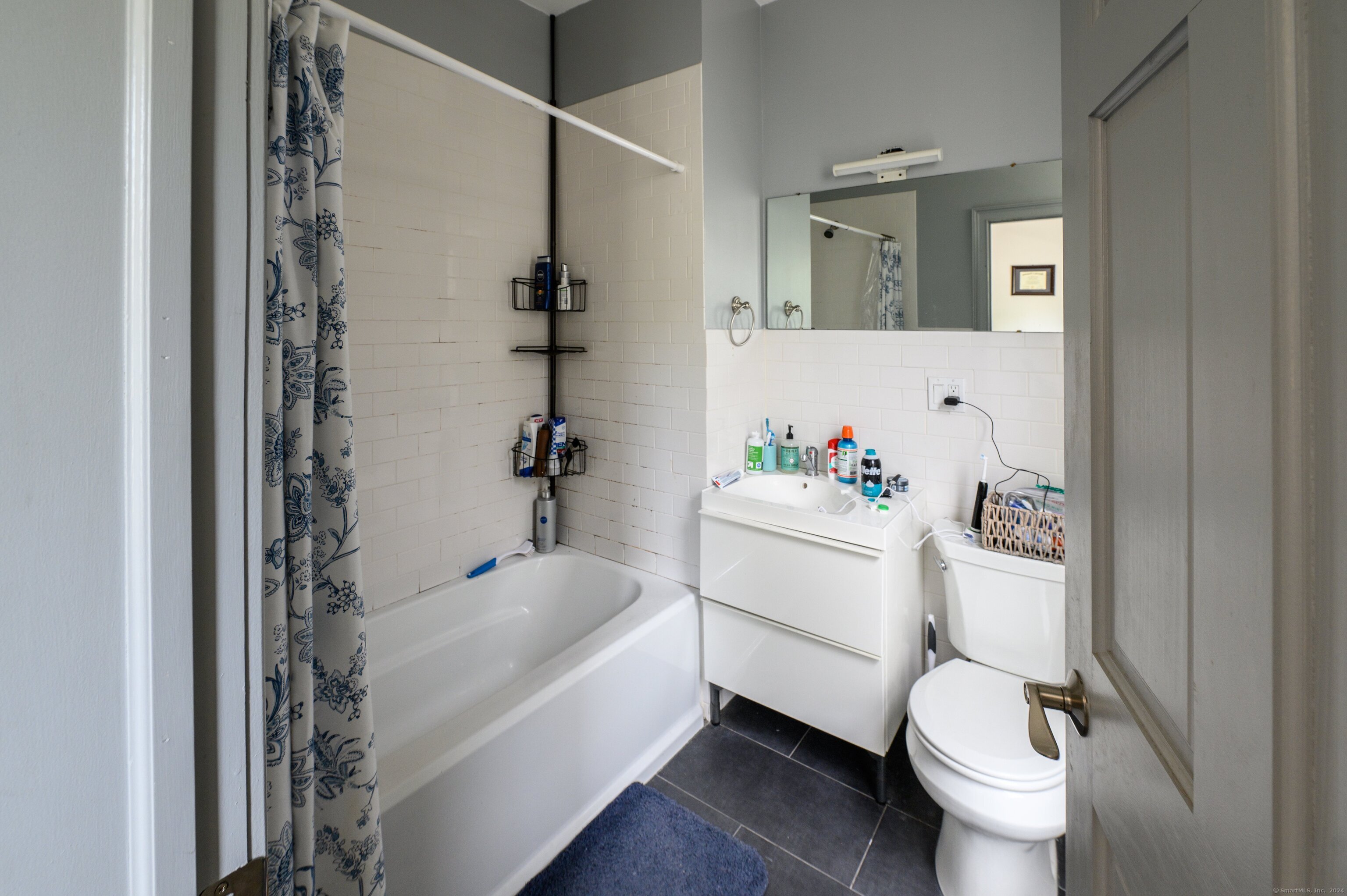 54 Mechanic Street New Haven, CT 06511 - Photo 6 of 22 a bathroom with a sink toilet and shower