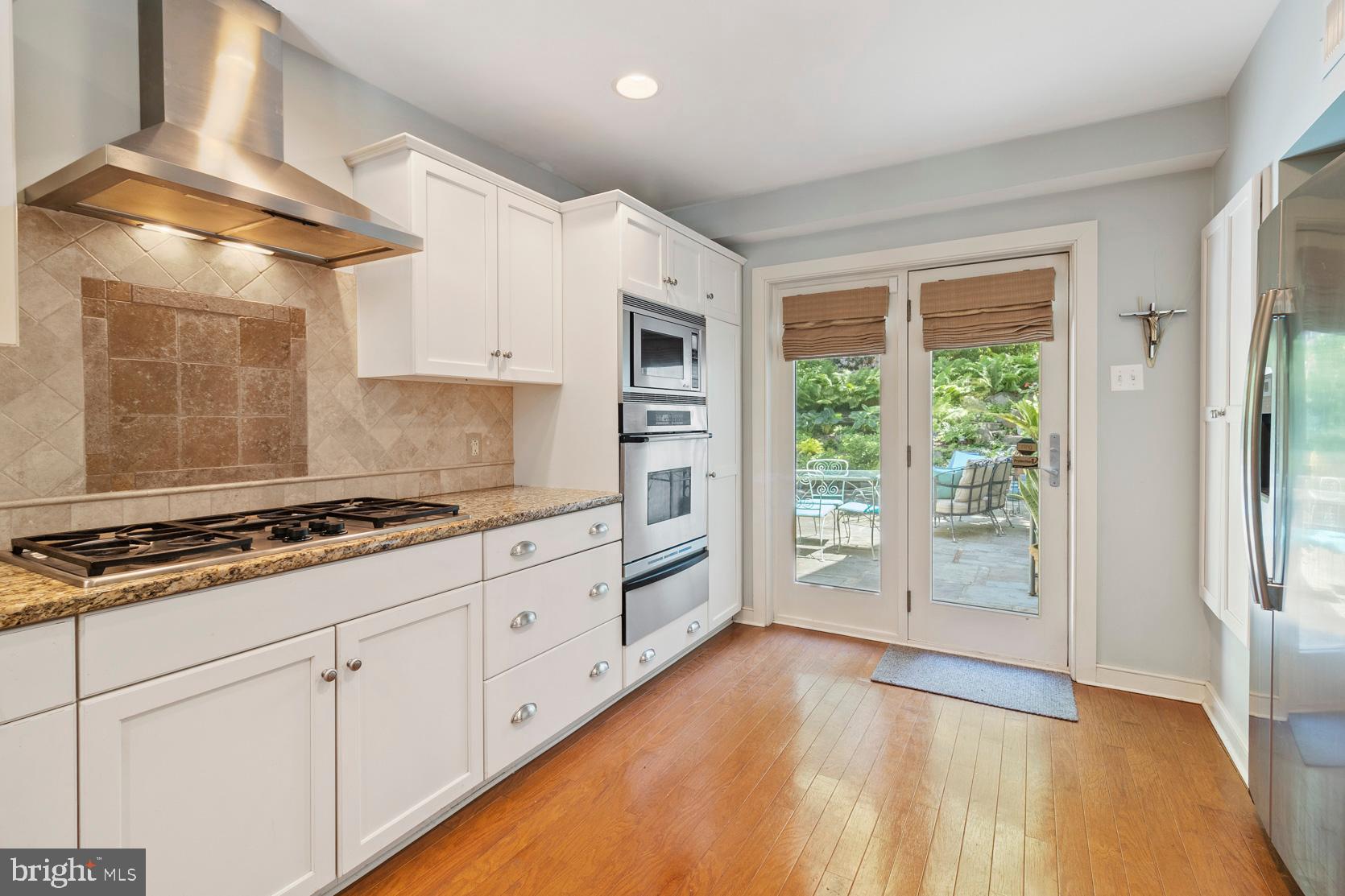 80 West Hampton Road Philadelphia, PA 19118 - Photo 7 of 52 Kitchen leads to the patio for dining al fresco!