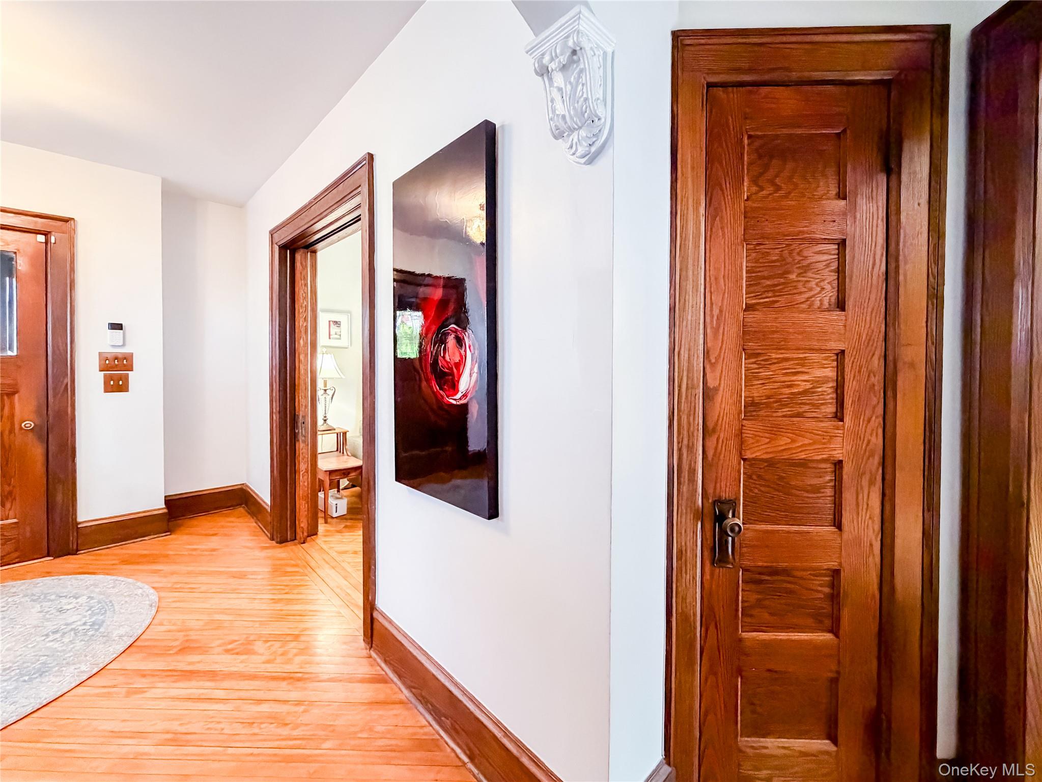350 Smith Street Peekskill, NY 10566 - Photo 5 of 32 a view of a hallway with wooden floor and closet