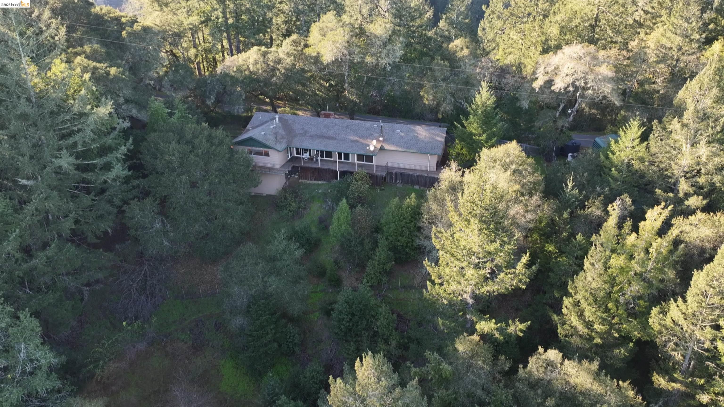 5051 Harrison Grade Road Sebastopol, CA 95472 - Photo 1 of 31 a view of a house with a yard