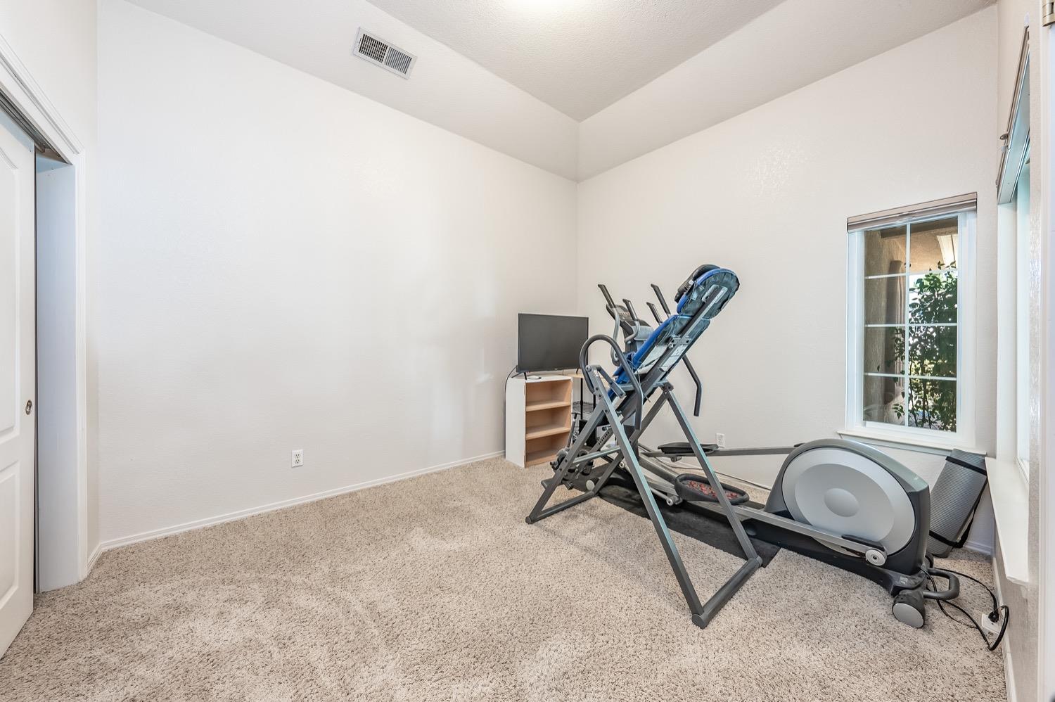 3432 Doubletree Way Madera, CA 93637 - Photo 4 of 45 a view of a workspace