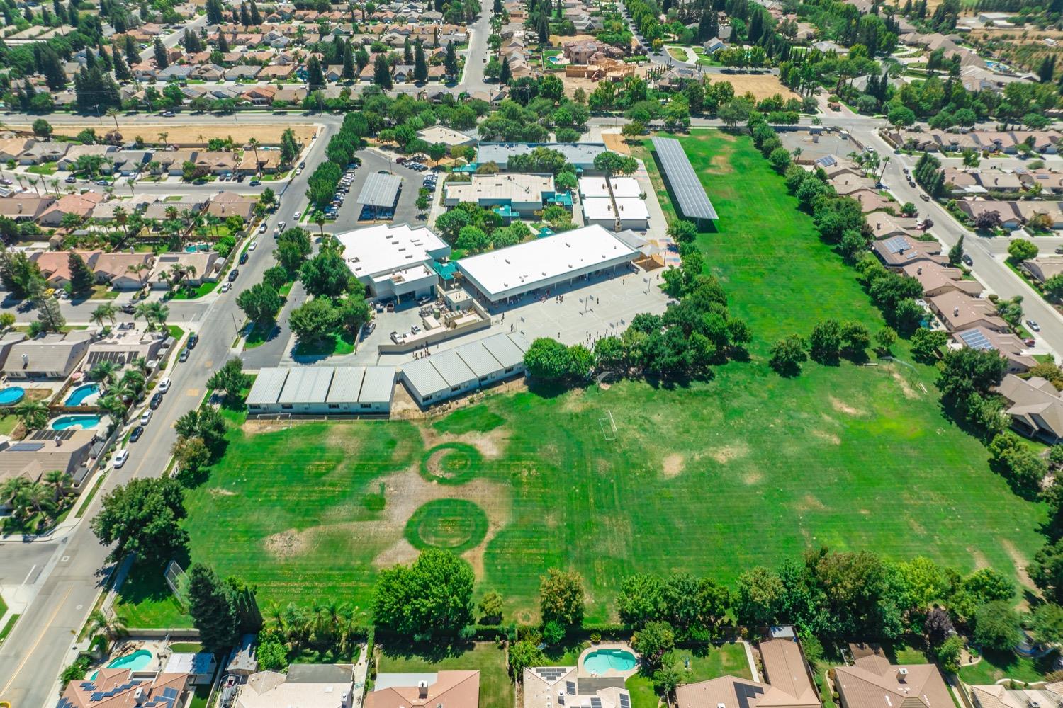 3432 Doubletree Way Madera, CA 93637 - Photo 44 of 45 an aerial view of residential houses with outdoor space and street view