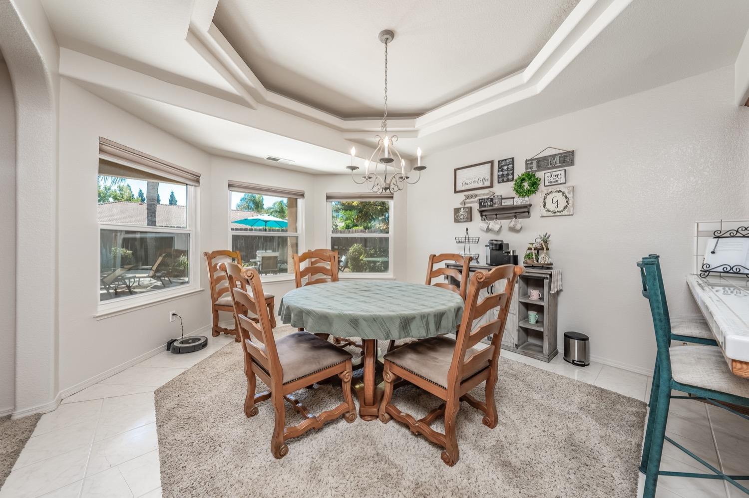 3432 Doubletree Way Madera, CA 93637 - Photo 7 of 45 a view of a dining room with furniture