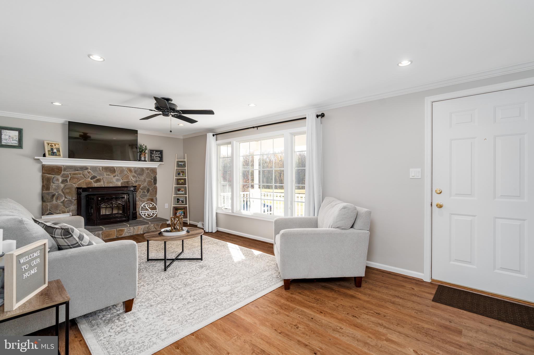 356 Knights Corner Road Elkton, MD 21921 - Photo 3 of 19 Spacious family room with stone fireplace