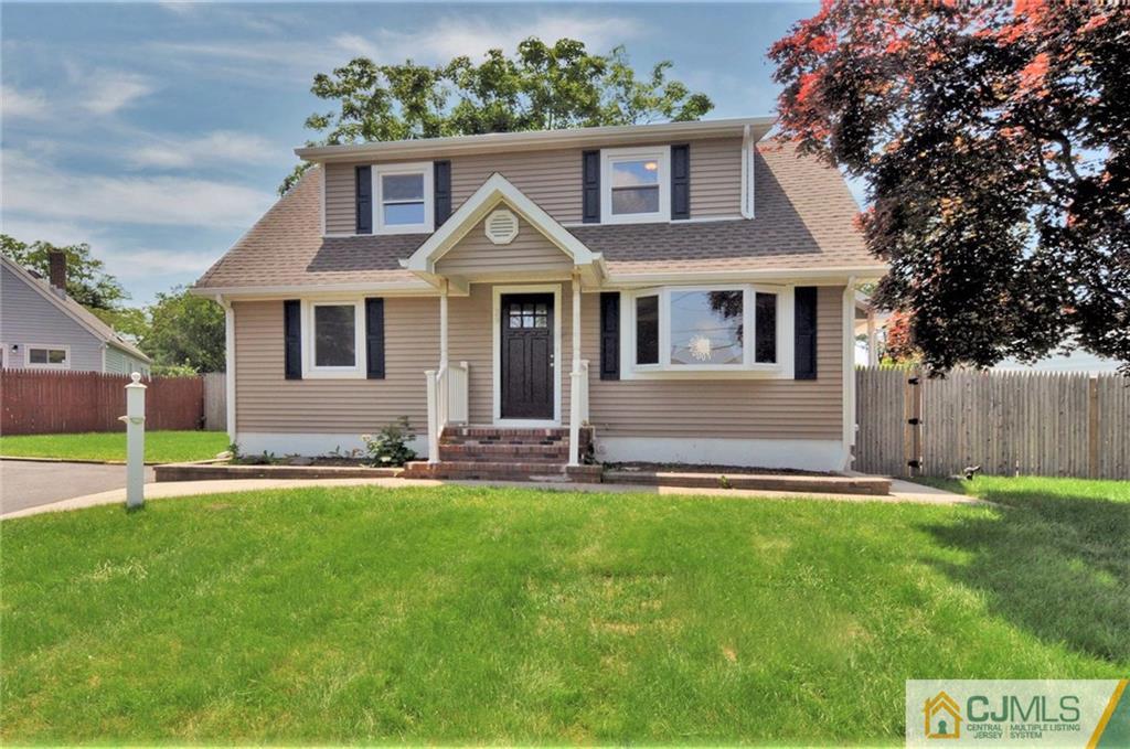 29 Stockton Road New Brunswick, NJ 08901 - Photo 1 of 21 a front view of a house with a yard and garage