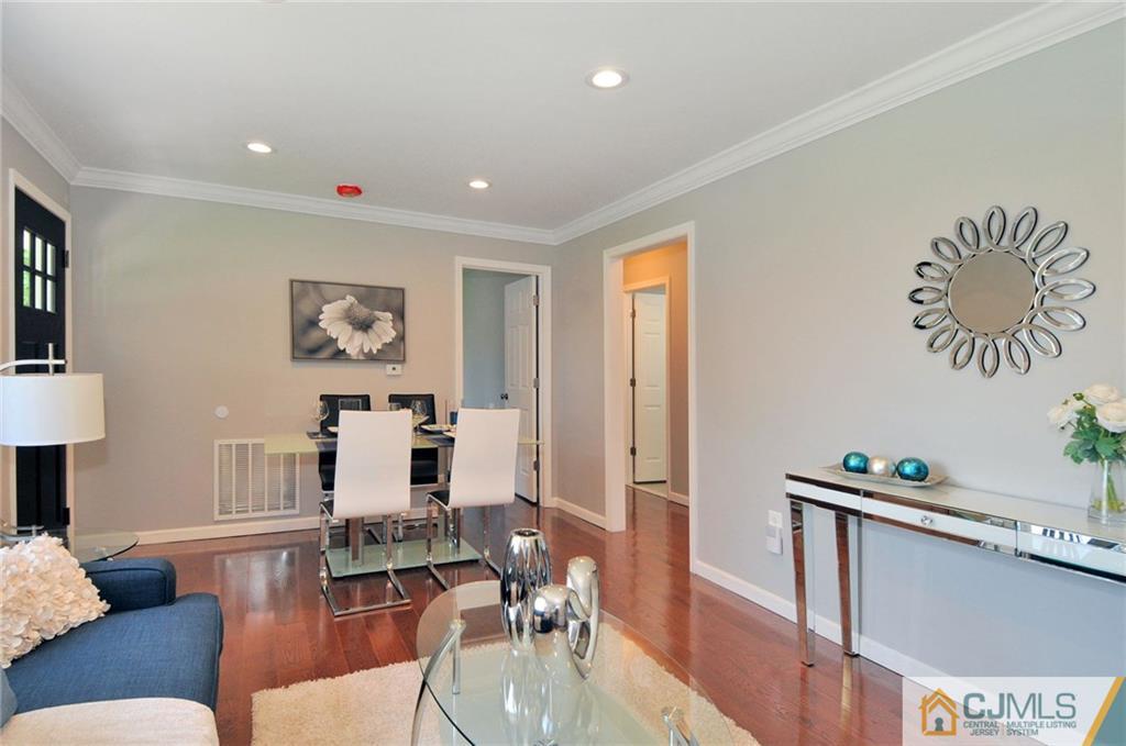 29 Stockton Road New Brunswick, NJ 08901 - Photo 4 of 21 a living room with furniture and wooden floor