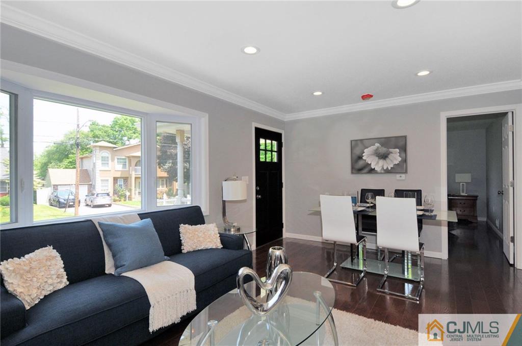 29 Stockton Road New Brunswick, NJ 08901 - Photo 5 of 21 a living room with furniture and a large window