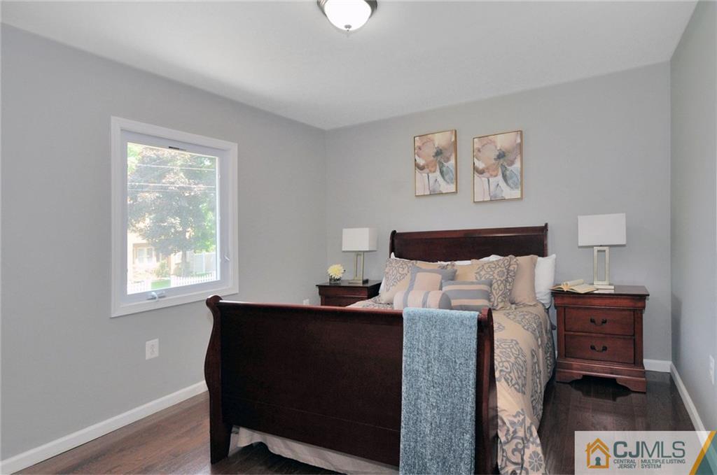 29 Stockton Road New Brunswick, NJ 08901 - Photo 10 of 21 a bedroom with a bed and a window