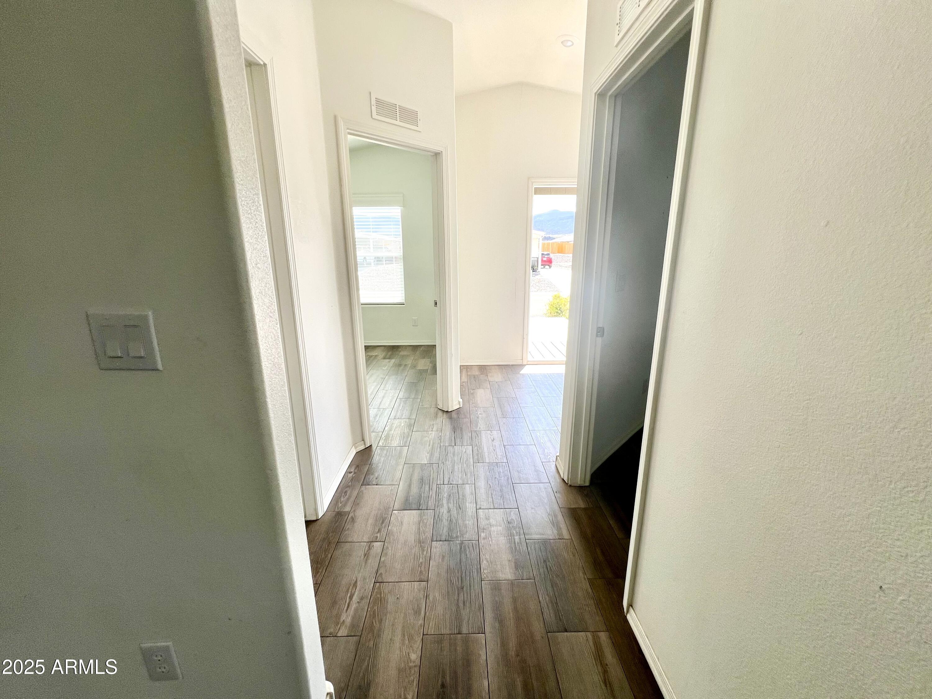 80 South Copper Canyon Loop Camp Verde, AZ 86322 - Photo 16 of 52 a view of a hallway with wooden floor and staircase