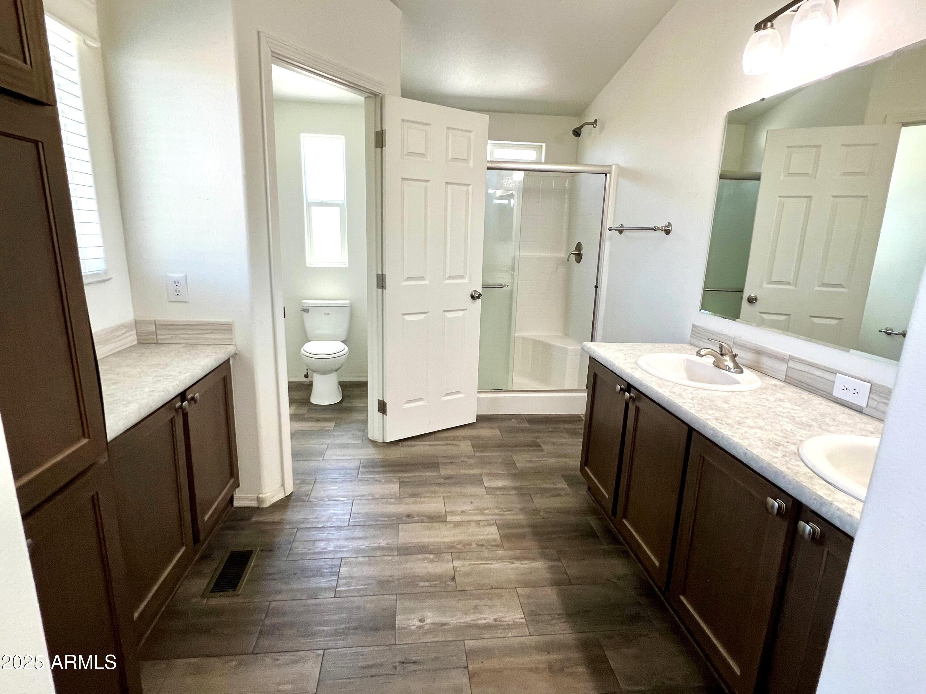 80 South Copper Canyon Loop Camp Verde, AZ 86322 - Photo 22 of 52 a bathroom with a double vanity sink and a mirror