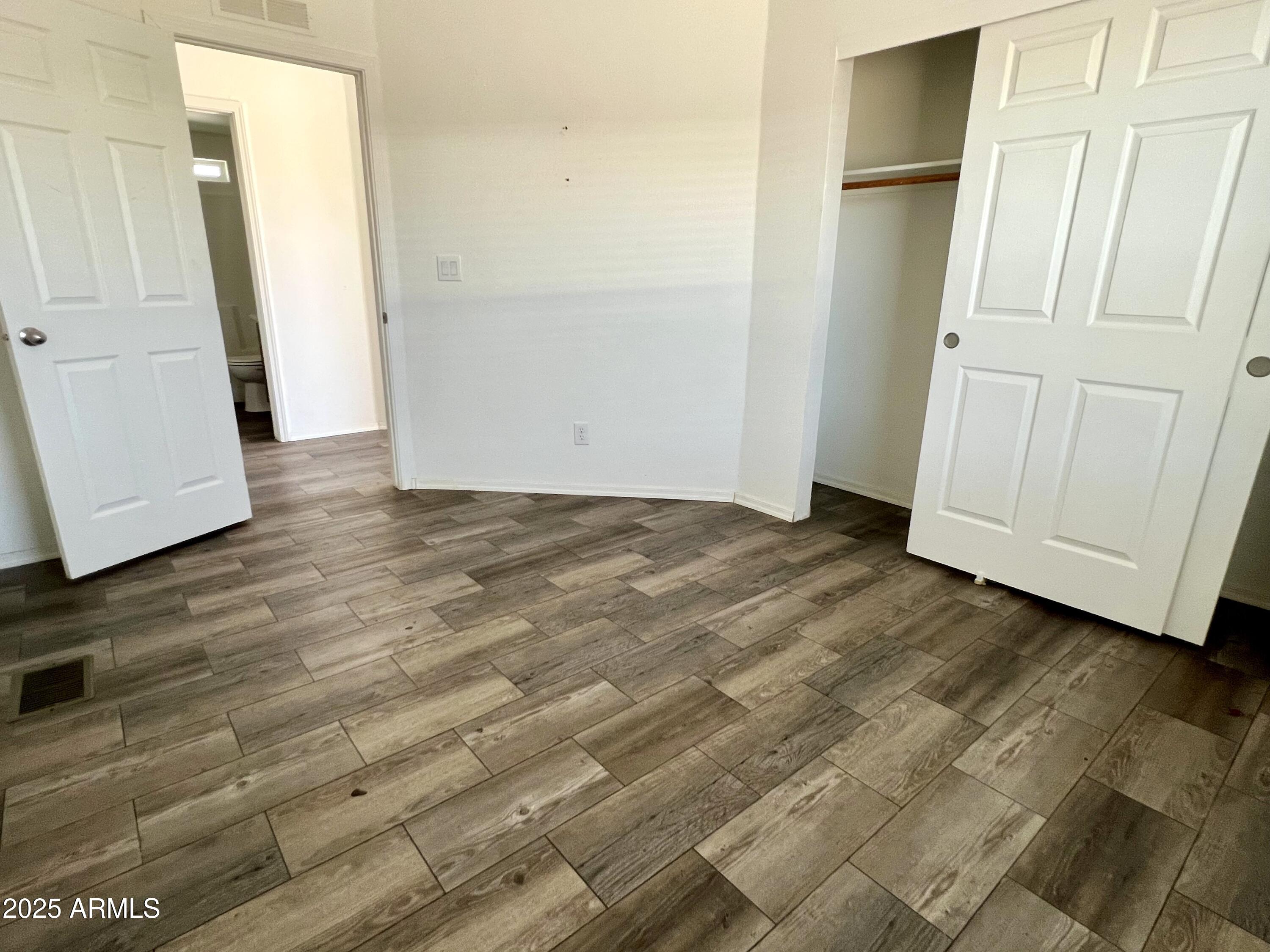 80 South Copper Canyon Loop Camp Verde, AZ 86322 - Photo 26 of 52 an empty room with wooden floor