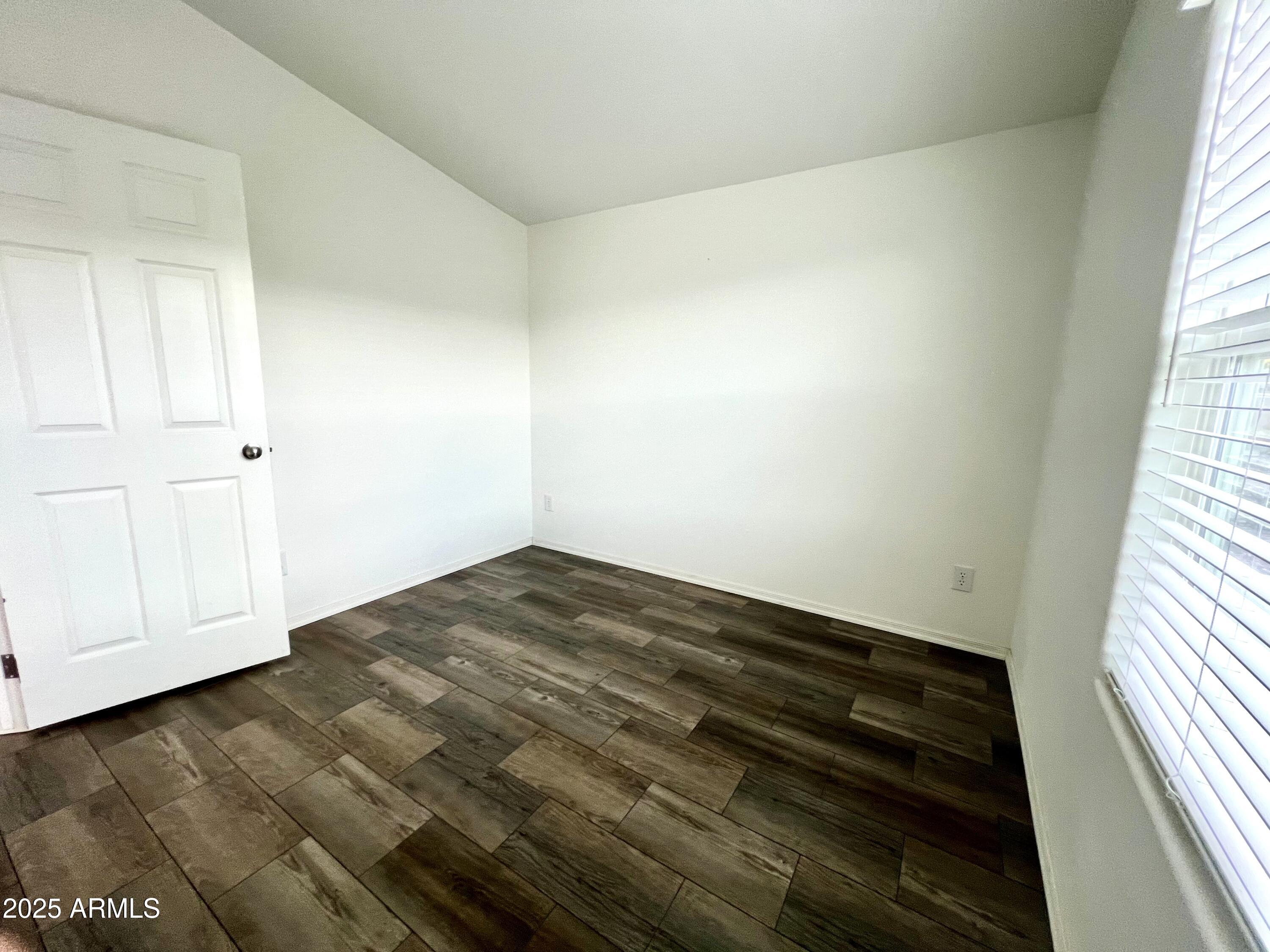 80 South Copper Canyon Loop Camp Verde, AZ 86322 - Photo 32 of 52 a view of a room with wooden floor and staircase