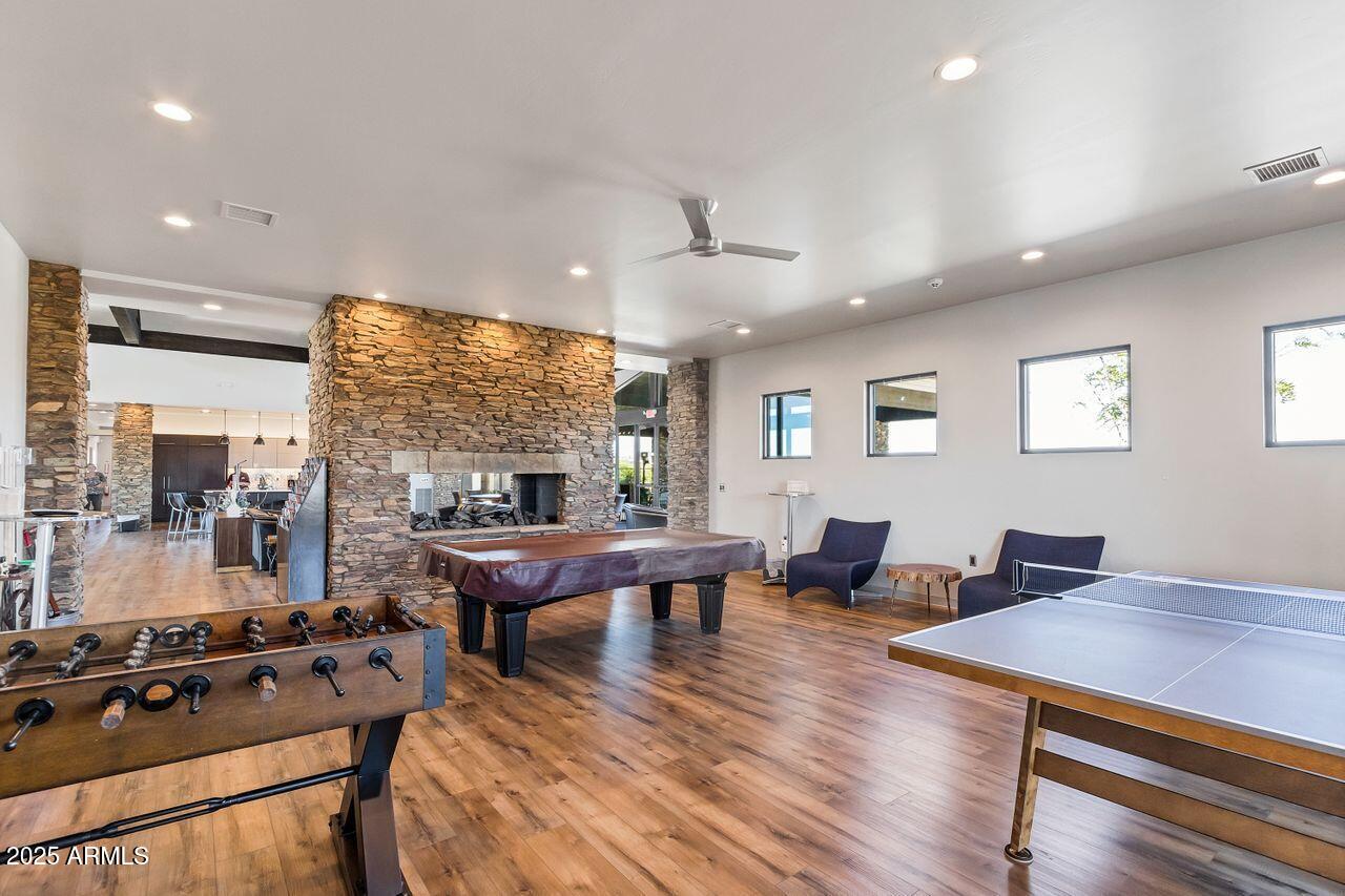 80 South Copper Canyon Loop Camp Verde, AZ 86322 - Photo 45 of 52 a living room with furniture a large window and wooden floor