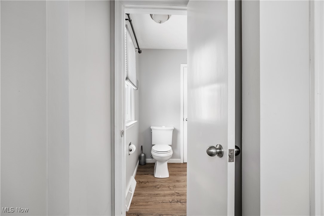 6059 Branch Road Medina, OH 44256 - Photo 20 of 39 Bathroom featuring toilet and wood finished floors