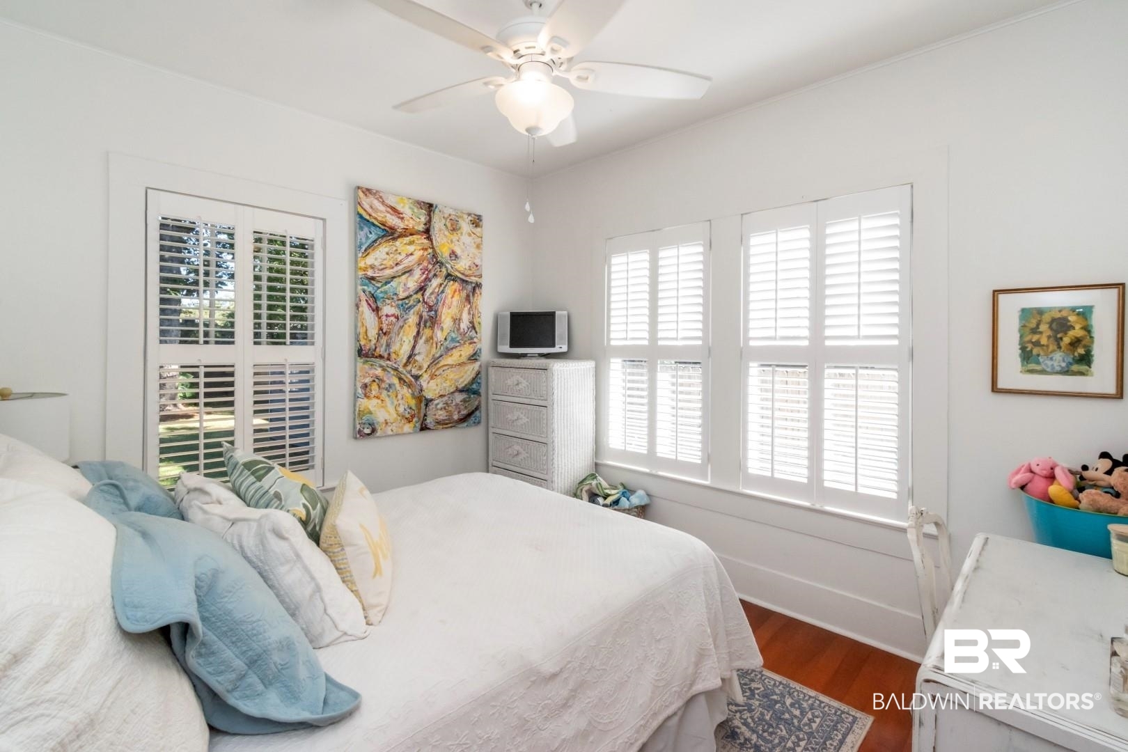 116 Item Avenue Mobile, AL 36607 - Photo 19 of 33 Bedroom featuring ceiling fan, hardwood / wood-style flooring, and multiple windows