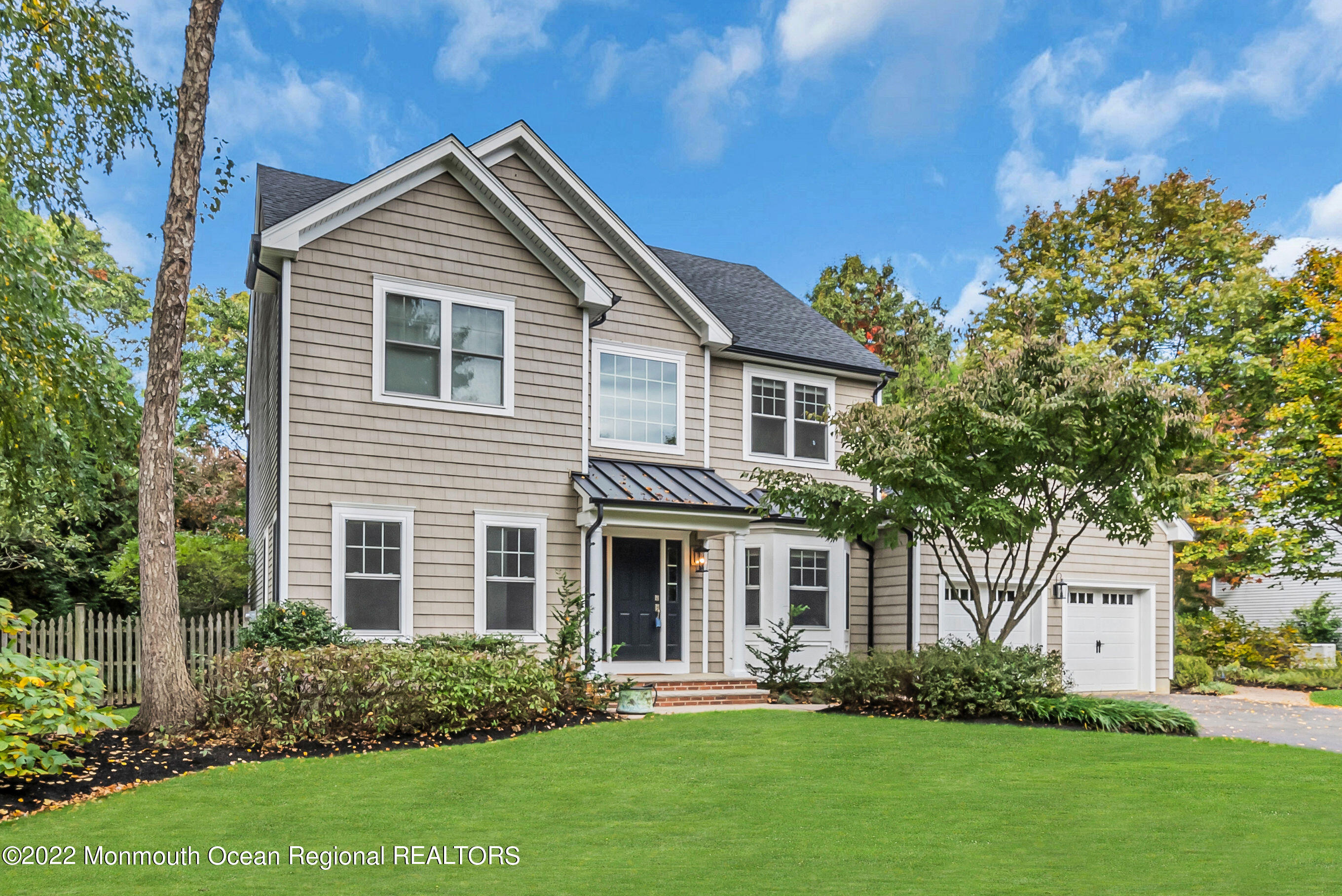6 Judy Road Eatontown, NJ 07724 - Photo 3 of 56 a front view of a house with a yard and trees