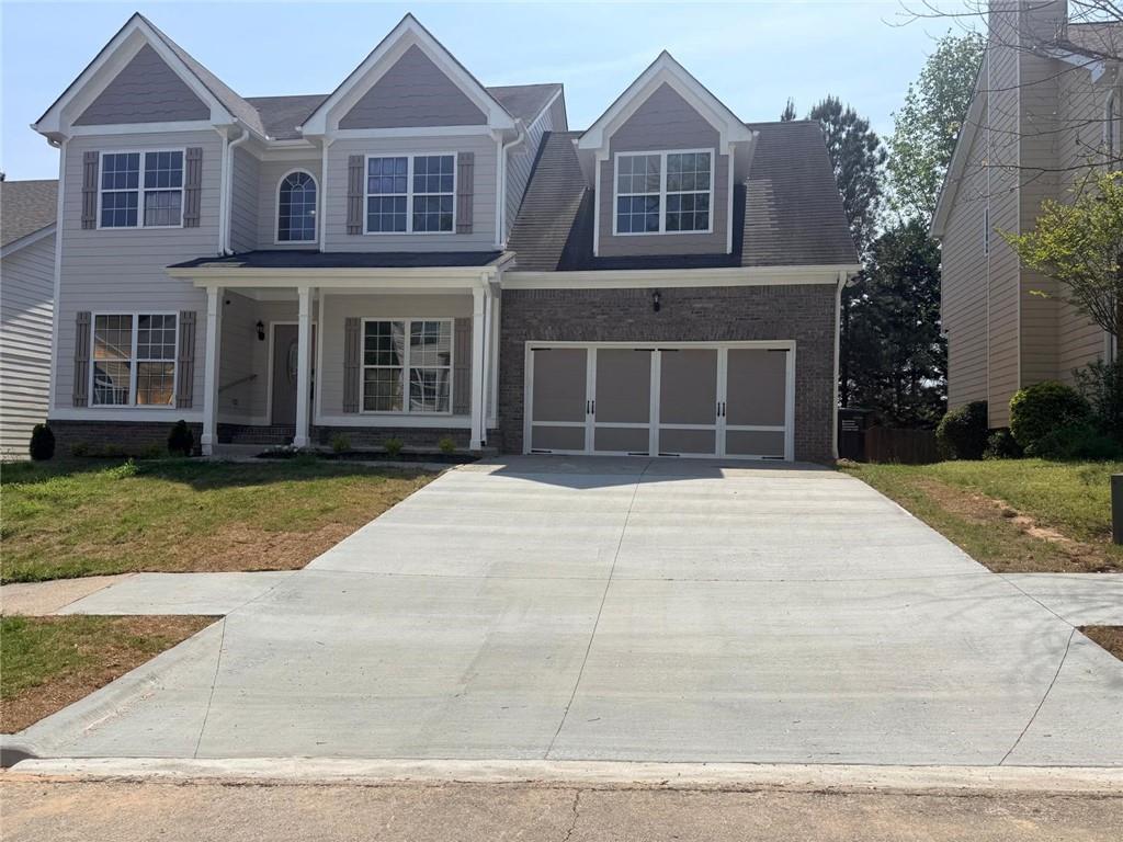 1549 Stewart Ridge Drive Buford, GA 30518 - Photo 1 of 32 front view of a house