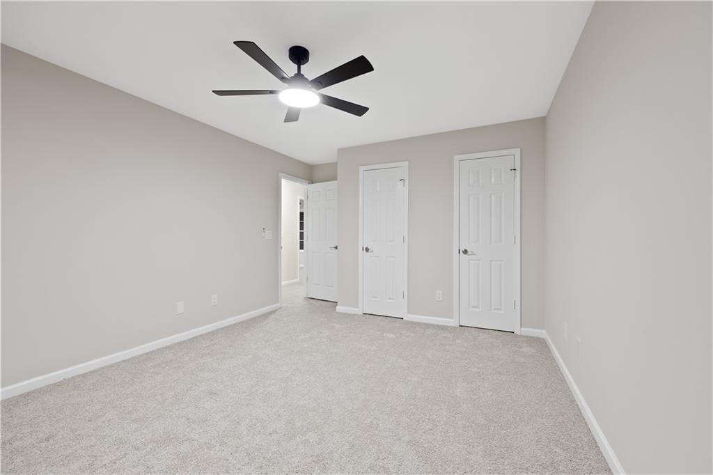 1549 Stewart Ridge Drive Buford, GA 30518 - Photo 20 of 32 a view of an empty room