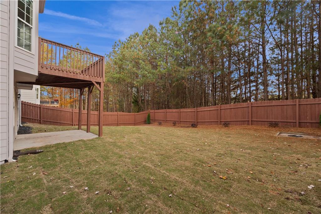 1549 Stewart Ridge Drive Buford, GA 30518 - Photo 30 of 32 a view of backyard space