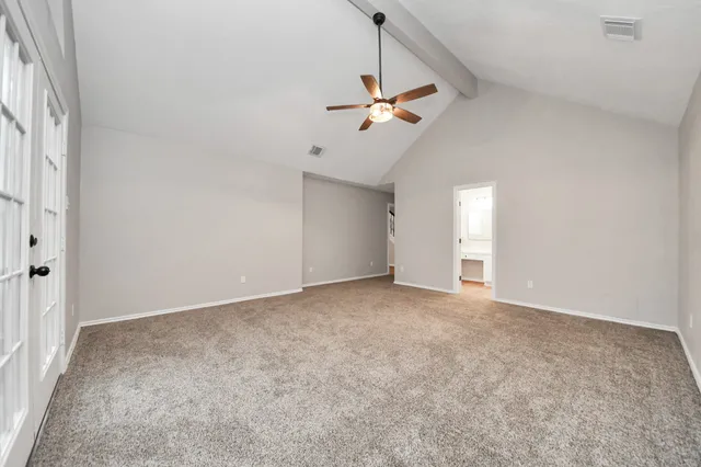 a bathroom with a sink a mirror and a shower