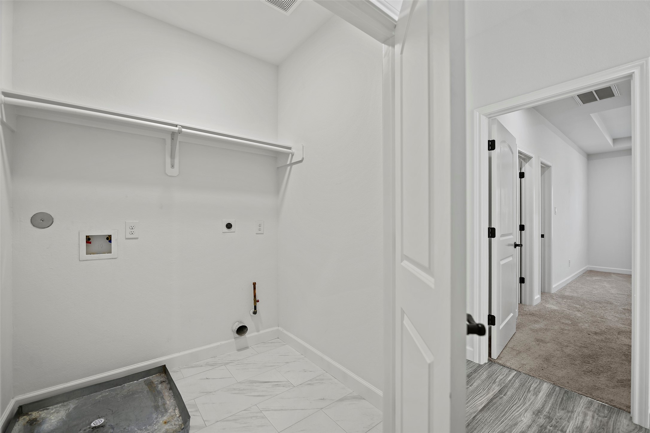 1071 St Clair Street Houston, TX 77088 - Photo 13 of 31 a view of a walk in closet