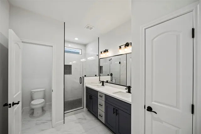 a bathroom with a sink and a shower