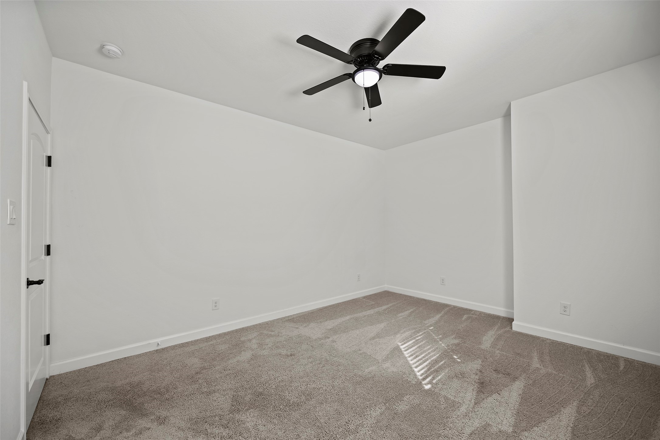 1071 St Clair Street Houston, TX 77088 - Photo 24 of 31 a view of a big room with a ceiling fan