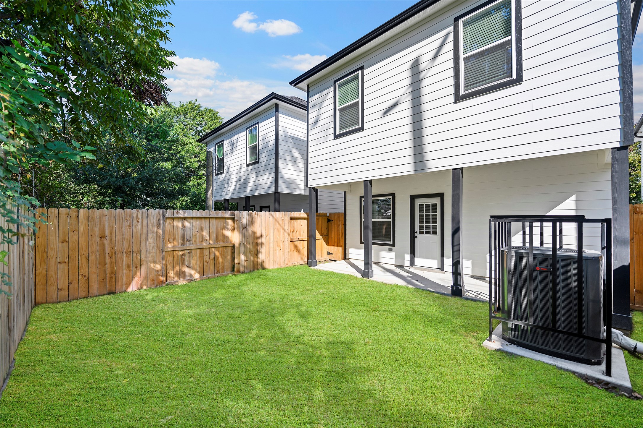 1071 St Clair Street Houston, TX 77088 - Photo 28 of 31 a view of a house with backyard and porch