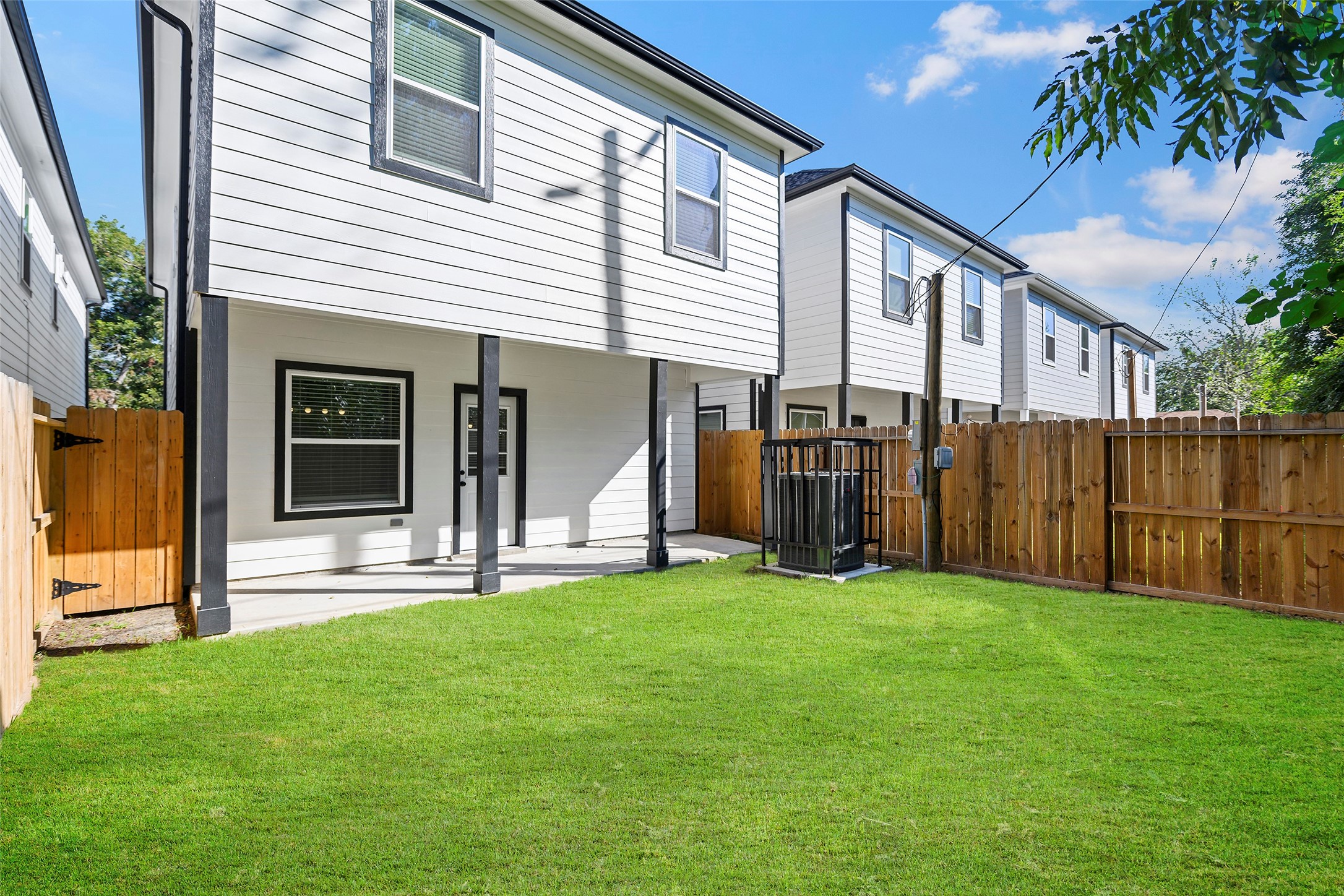 1071 St Clair Street Houston, TX 77088 - Photo 29 of 31 a large white house with garden in front of it