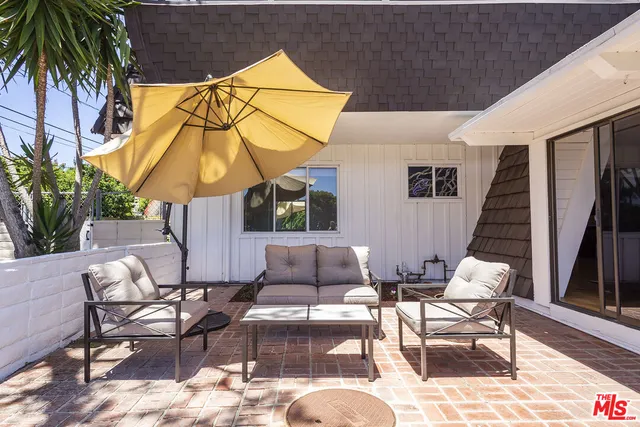 a outdoor space with patio the couches and pool
