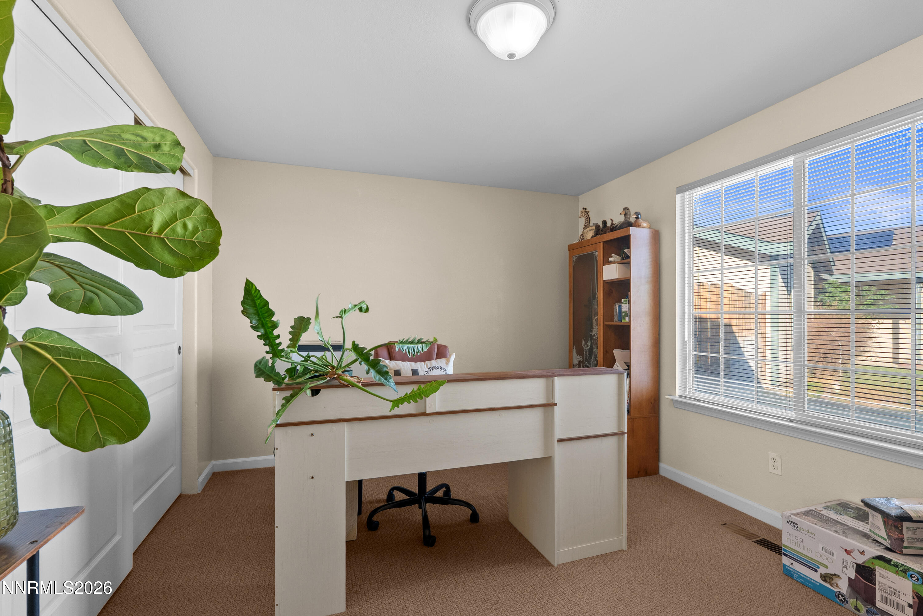552 Spur Court Fernley, NV 89408 - Photo 32 of 46 a dining room with furniture and window