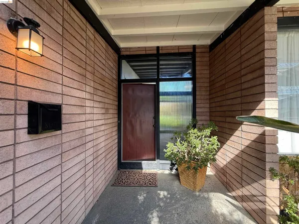 a view of a entryway door front of house