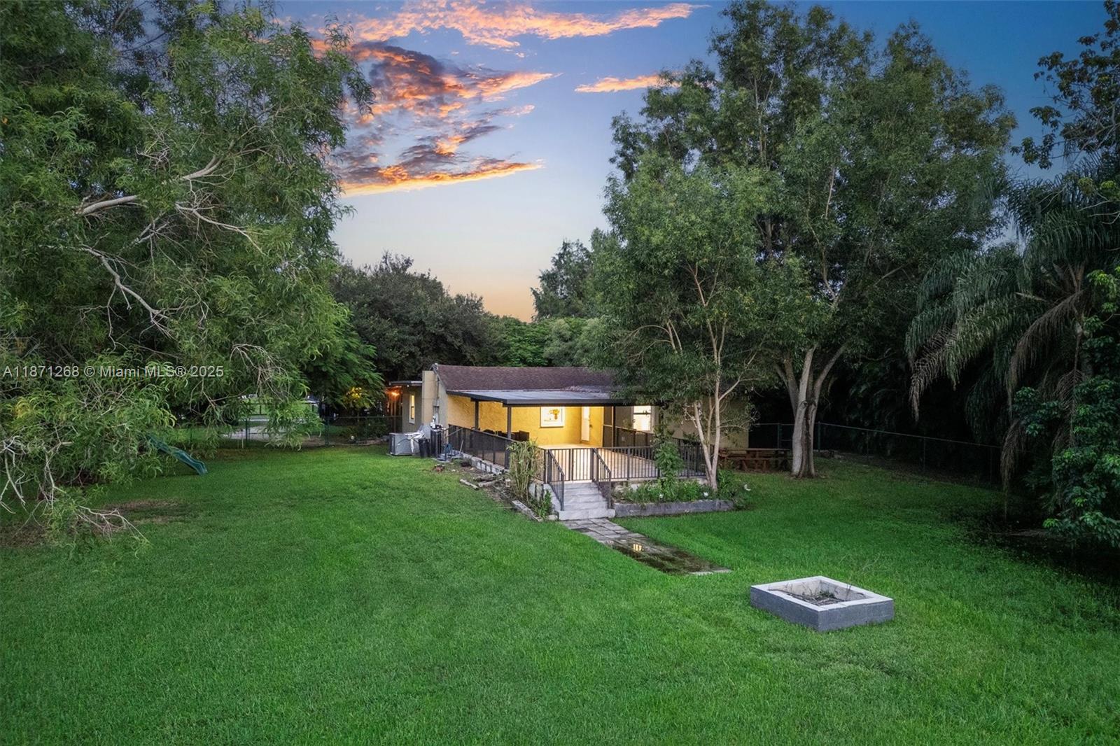 a view of a backyard with a garden
