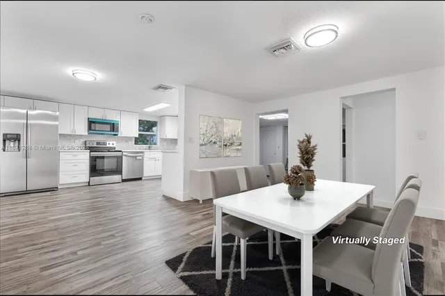 a bedroom with a bed and a cabinets