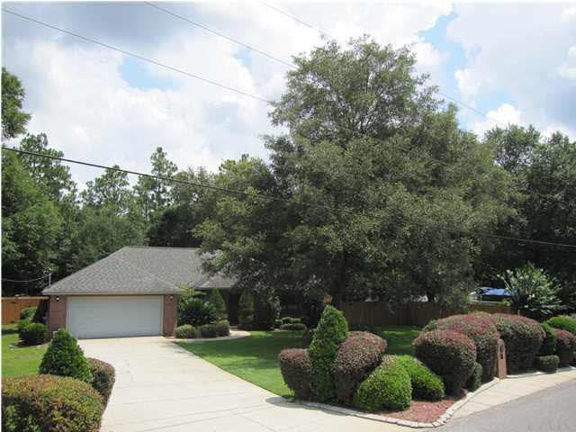 5918 Country Club Road Milton, FL 32570 - Photo 4 of 25 Magnificent view of this . 75 acre home site. See boat in driveway to the right which would work also for Mobile home parking.