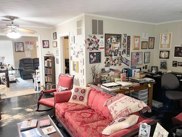 4468 Garnett Road Memphis, TN 38117 - Photo 2 of 14 a living room with furniture a rug and a window