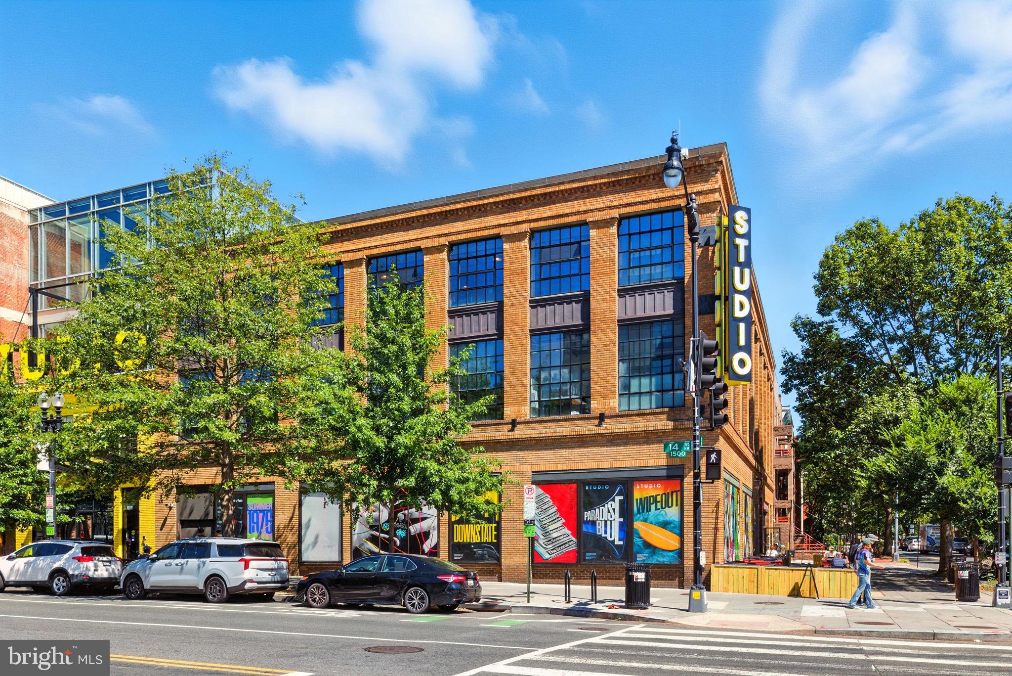 1011 M Street Northwest, Unit 901 Washington, DC 20001 - Photo 24 of 26 a view of a building and a street view