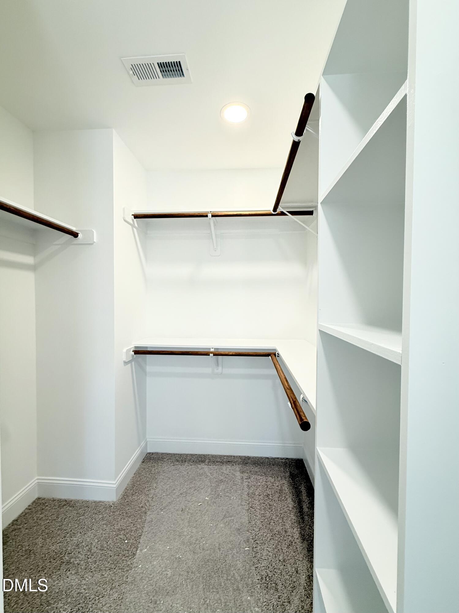 6800 Fire Tower Road Spring Hope, NC 27882 - Photo 21 of 36 a view of walk in closet