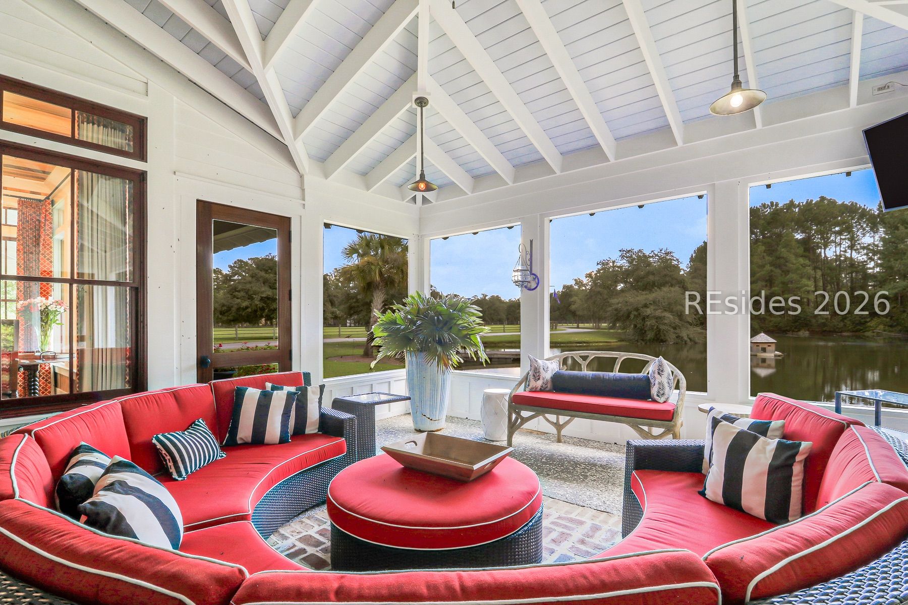 165 Golda Drive Ridgeland, SC 29936 - Photo 47 of 100 Screened Porch overlooking Pool/Lake