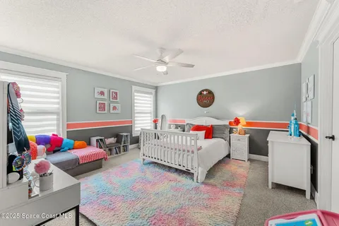 a bedroom with furniture and a couch