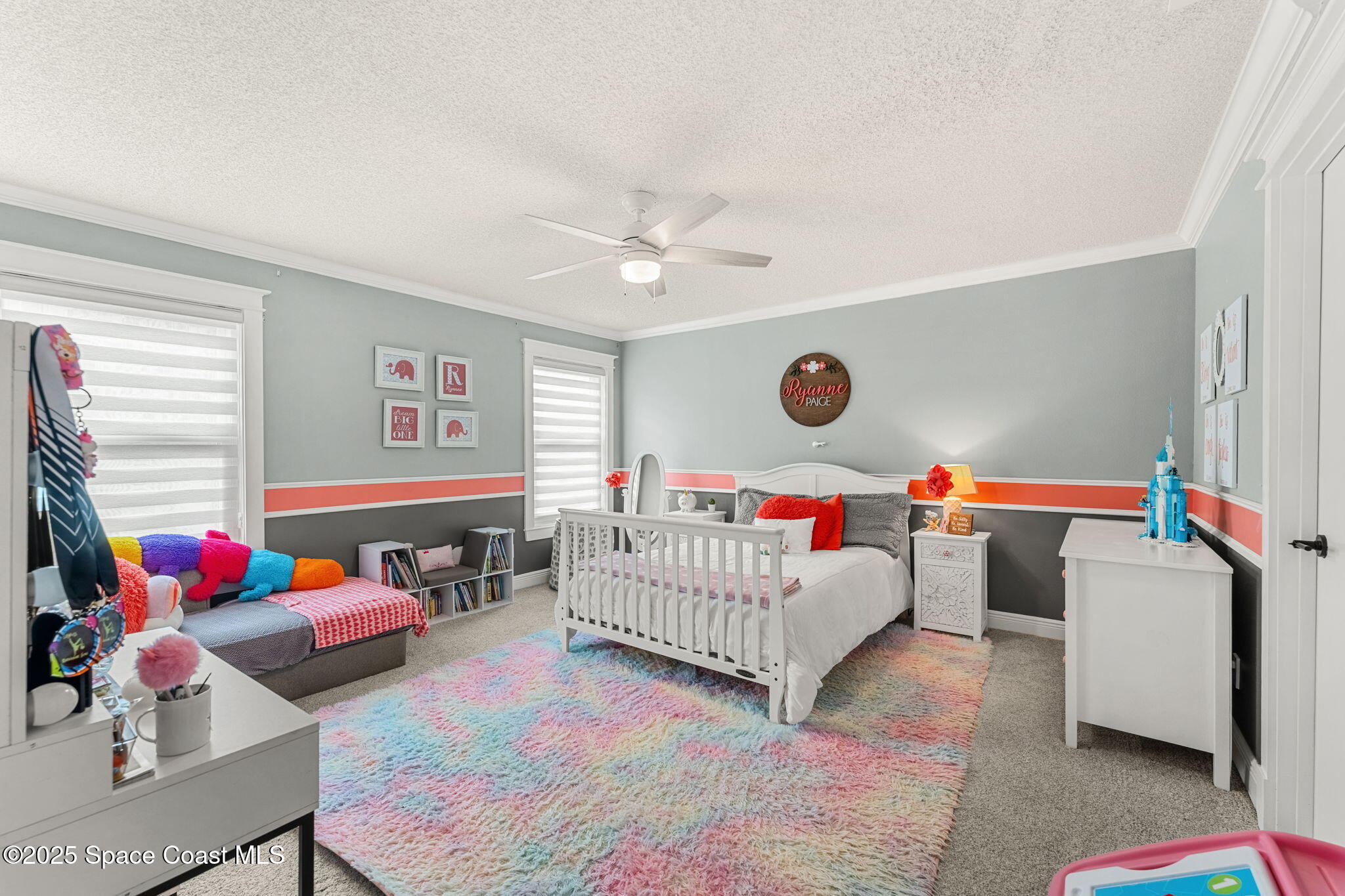 2525 Forest Run Drive Melbourne, FL 32935 - Photo 18 of 36 a bedroom with furniture and a couch